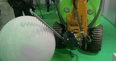 On exhibition Robotix expo seen industrial robot Kuka video