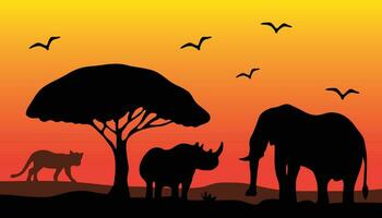 Silhouette of animals and trees in a savanna during the evening. vector