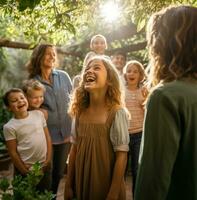 The girl is standing in the center of the frame surrounded by her family and friends, nature stock photo