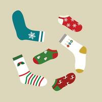 Set of Socks with Christmas pattern colored illustration vector isolated on light blue background. Clothes accesories. Warm clothes