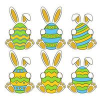 Set of colorful Easter eggs with bunnies vector