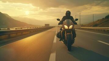 generativo ai, motocicleta jinete en calle equitación, puesta de sol cielo, teniendo divertido conducción el vacío autopista en un motocicleta excursión viaje foto