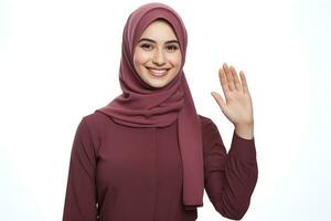 Hijab woman waving hand isolated on white background AI Generated photo