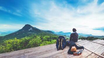 Lover Men and women Asia travel relax. Morning atmosphere nature Forests, mountains. Phu Thap Buek Thailand photo