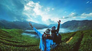 lover woman and man asian travel nature. Travel relax. Natural park on the Moutain. Thailand photo