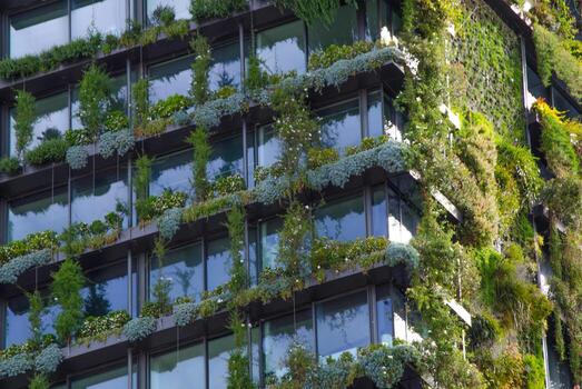 Greenery exterior glass window building full of plants, Green architecture is a style of designing and building structures that emphasize environmentally friendly practices photo
