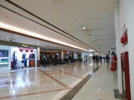 Sidoarjo, East Java, Indonesia - August 25 2023 - The atmosphere inside the Juanda international airport terminal is rather quiet for passengers in the morning photo