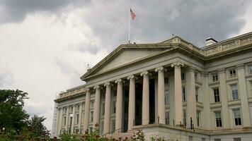 Flag Waving in Slow Motion on Department Of Treasury Building in Washington, D.C. video