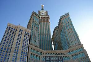 Mecca, Saudi Arabia, January 9, 2013. Skyline with Abraj Al Bait - Royal Clock Tower Makkah from lower angle. photo