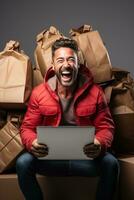 Excited man opening Cyber Week parcels isolated on a white background photo