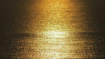 Beautiful golden sunset on sea with waves video