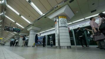 Timelapse shot of people on underground station in Seoul, South Korea video