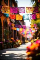 vistoso papel picado pancartas revoloteando en día de el muerto festividades foto