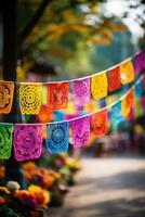 vistoso papel picado pancartas revoloteando en día de el muerto festividades foto