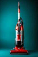 A modern professional vacuum cleaner isolated on a red gradient background photo