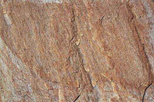 Mountain rock texture. Natural brown slate granite slab marble stone ceramic seamless tile rough surface background. Architecture grunge modern abstract style element. Close-up, copy space photo