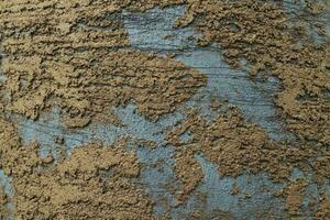 Grey and blue concrete wall background texture with plaster. Detail rough stucco cement wall photo