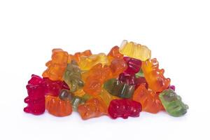 Colorful jelly bears candies on isolated white background photo