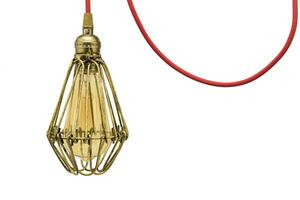 Decorative red wired pendant lamp with a brass metal protective cage on isolated white background photo