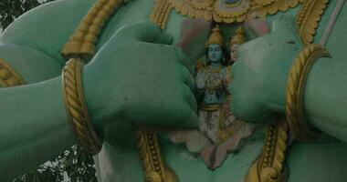 Statue of Hanuman showing Rama in his heart video