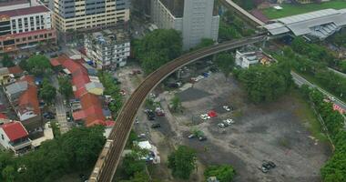 Daytime panorama of city Kuala Lumpur, Malaysia with railway with a passing train video