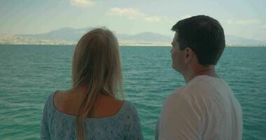 Woman and man speaking on boat against sea landscape Piraeus, Greece video