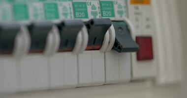 Female hand pressed to button of automatic circuit breaker video