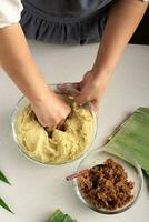 Kneading Dough Making Asian Traditional Snack with Palm Sugar Wrapped photo