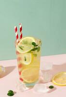 Lemonade or Mojito Cocktail with Lemon and Mint Leaf photo