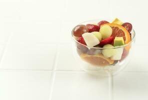 Fresh Fruit Salad on Clear Bowl photo