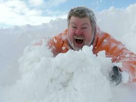 Man enjoys the winter snowy day in playful pose AI Generative photo