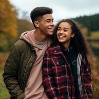 Loving teenage interracial couple is enjoying a romantic autumn day AI Generative photo