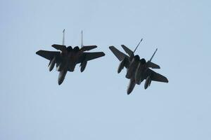 Military fighter jet plane at air base. Airport and airfield. Air force flight operation. Aviation and aircraft. Air defense. Military industry. Fly and flying. photo