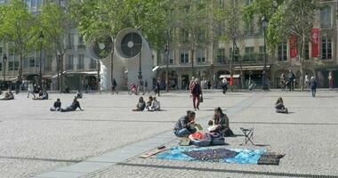 Walking and relaxing people on square of Pompidou Centre video