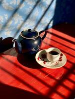 ai generativo té taza y rojo tetera con planta en de madera mesa foto