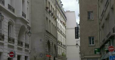 Parisian street with Hotel banner on the building video