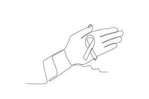 A hand holding an AIDS awareness ribbon vector