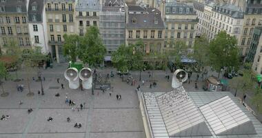 Pigeons flying over the Parisian street video