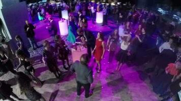 Aerial view of people on the party in club video