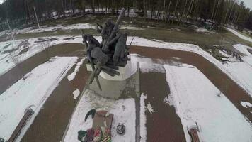 Flying over war monument by the highway video