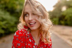 attractive stylish blond smiling woman in straw red blouse summer fashion photo