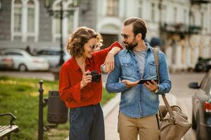 man and woman on romantic vacation walking together photo