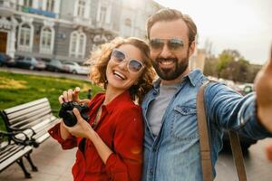 man and woman on romantic vacation walking together photo