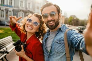 man and woman on romantic vacation walking together photo