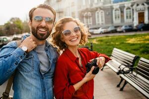 man and woman on romantic vacation walking together photo