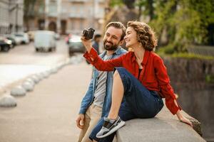 man and woman on romantic vacation walking together photo