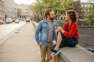 man and woman on romantic vacation walking together photo