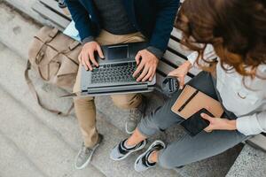 man and woman business partners working together photo