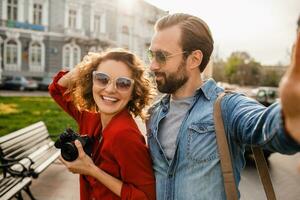 man and woman on romantic vacation walking together photo