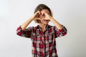 joven emocional mujer en a cuadros camisa foto